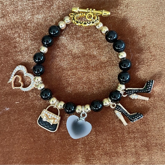 New handcrafted shopping themed bracelet combines blackbeads & goldaccents - Picture 7 of 8